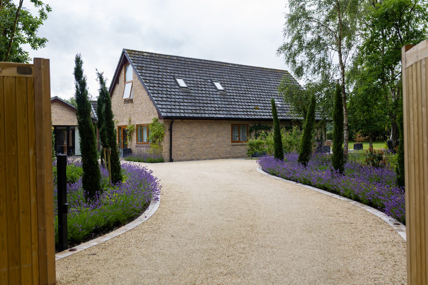 The automatic gates and gravel driveway at Warren House
